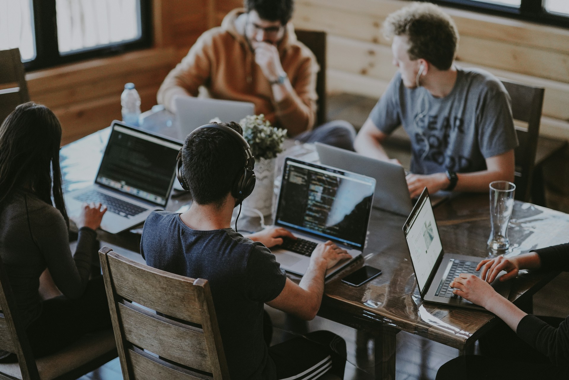 Two engineers pair programming on an AI assistant build